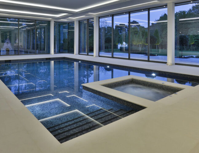 Indoor Falcon Pool with a custom spa pool area