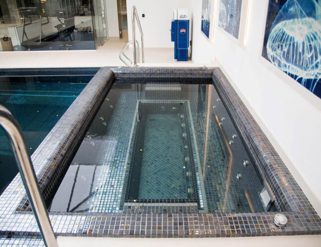 Custom plunge pool with metal mosaic finishing in Lava
