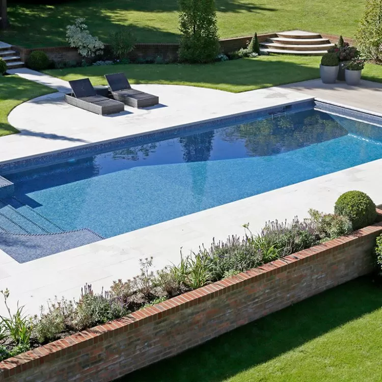 A classic style outdoor Falcon Pool with Roman style steps
