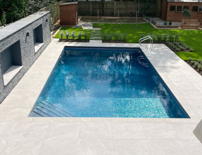 Outdoor Falcon Pool with tiled corner steps and pool ladder
