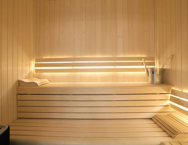 Wooden sauna with lighting